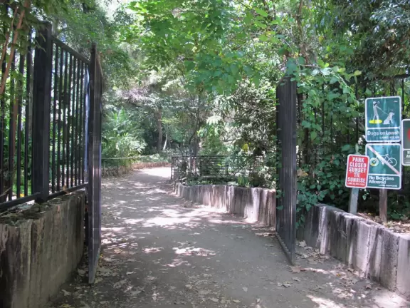 Enjoy a walk through tropical gardens next to a bubbling brook, and then a rest in a shady picnic area with a playground.