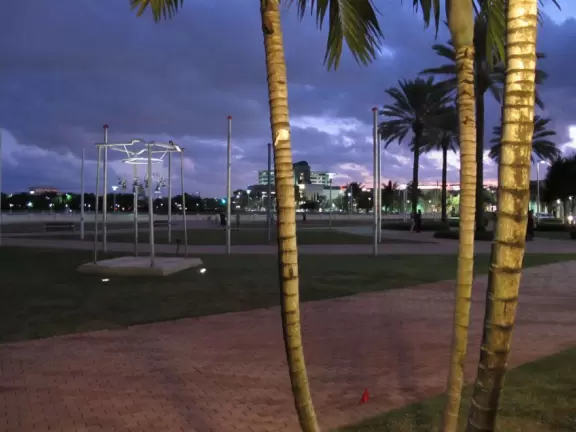 An outdoor mall with lots of open space and stark, white decor. Kids like the splash pad by the frozen yogurt shop, and couples like a romantic walk around the lake.