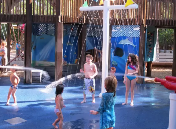 Amazing wooden playground with splash pad and gizmos galore, plus carousel and free science museum, all in a tropical setting.