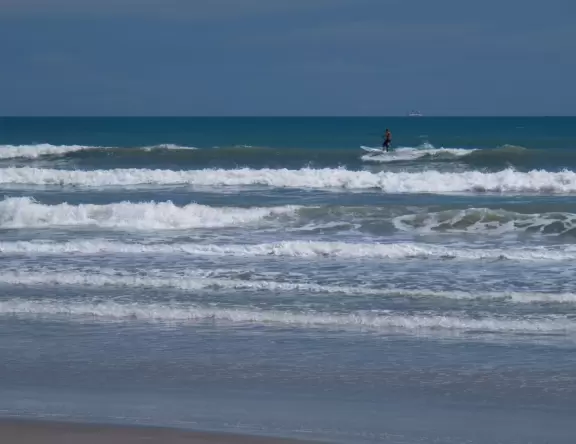 Best surfing in Florida! Beach and pier with slightly rundown restaurants.