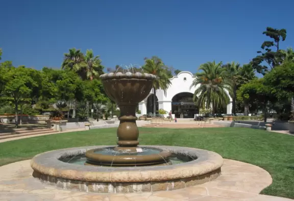 A remarkably pretty planned park with a stream that runs through it, lots of plants, an imaginative Spanish playground, and whale statues that spout water!