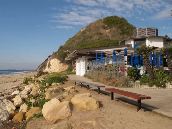 A popular beach with families and dog owners. Come for a long walk under beautiful cliffs.