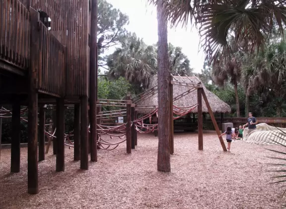 Amazing wooden playground with splash pad and gizmos galore, plus carousel and free science museum, all in a tropical setting.