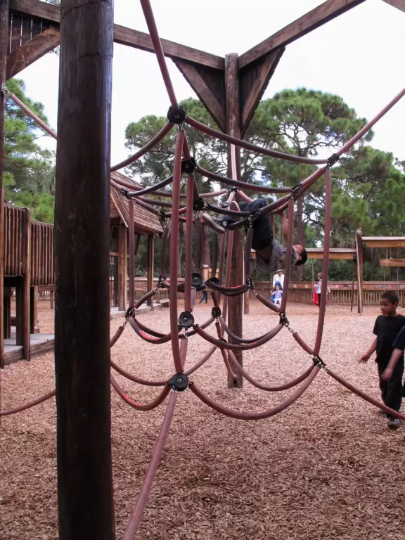 Amazing wooden playground with splash pad and gizmos galore, plus carousel and free science museum, all in a tropical setting.