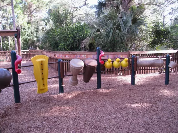 Amazing wooden playground with splash pad and gizmos galore, plus carousel and free science museum, all in a tropical setting.