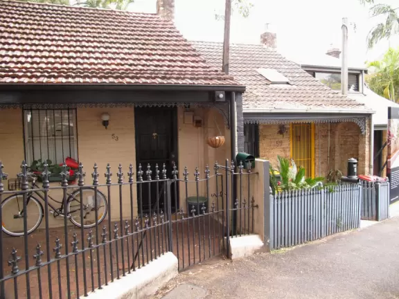 Little shops and cafes in streets lined with Victorian townhouses.