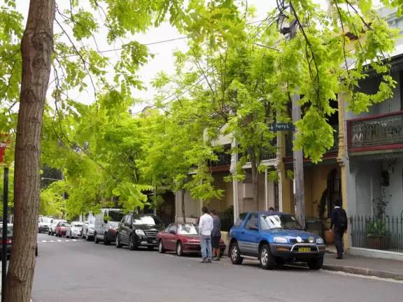 Little shops and cafes in streets lined with Victorian townhouses.