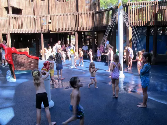 Amazing wooden playground with splash pad and gizmos galore, plus carousel and free science museum, all in a tropical setting.