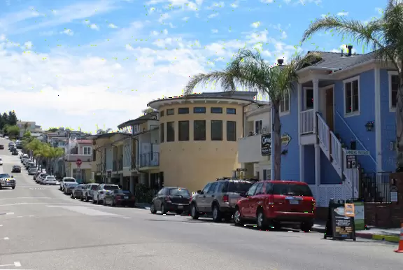 Colorful, pretty main street and boardwalk, with great cafes, lovely ship playground, and mesmerizing yellow cliffs.