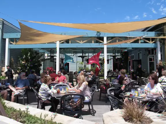 Colorful, pretty main street and boardwalk, with great cafes, lovely ship playground, and mesmerizing yellow cliffs.