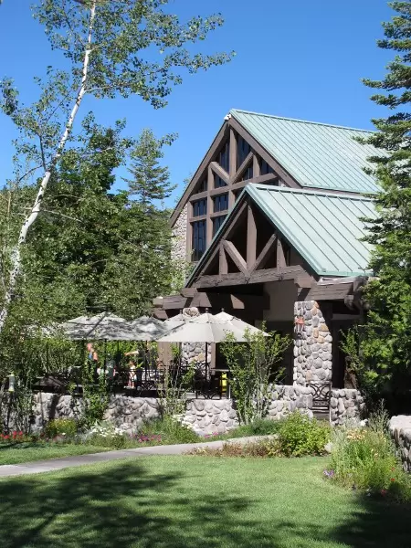 Dine out on a lovely patio perched up high, surrounded by mountains layered in pines.
