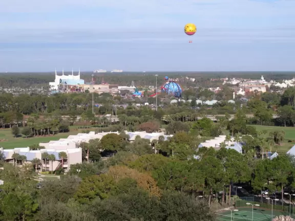 A paradise of waterfalls cascading into a huge heated pool, a splash pad, and a waterpark with lazy river.