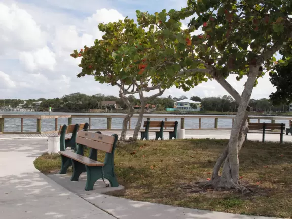 Waterfront park with amazing colors in the water- views of an island and blue-green sandbars. Plenty of benches and docks, and a playground.