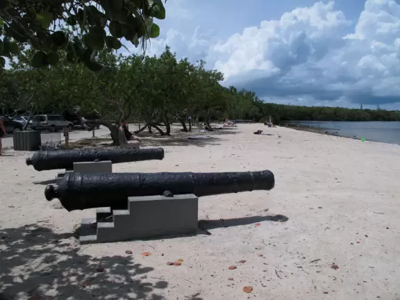 Swampy place with a rocky beach, dull visitor center, nice gift shop, and good snorkel and glass bottom boat tours.