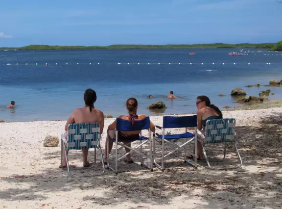 Swampy place with a rocky beach, dull visitor center, nice gift shop, and good snorkel and glass bottom boat tours.