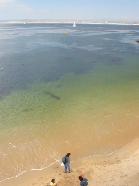 A touristy, yet pretty, waterfront area with shops and restaurants.