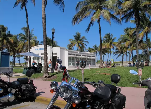 Gorgeous ocean colors, fun crowd of families, shallow water with little bouncy waves.