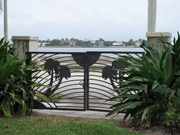 Paradise of tropical palms and plants, with large ominous sculptures and an interesting artist's studio.