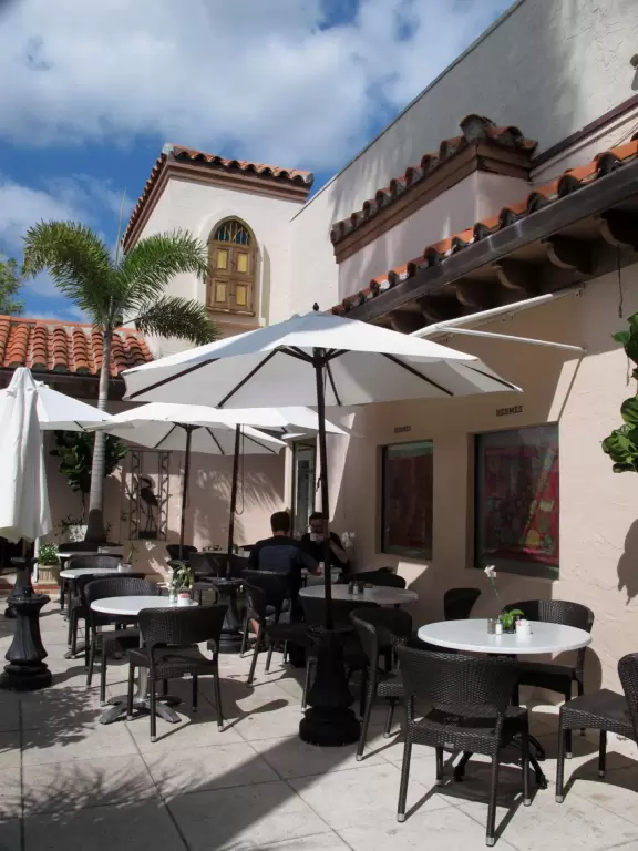 A sumptuous street with Spanish archways and courtyards and unique shops for the extremely rich.