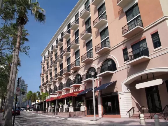 Main strip of West Palm Beach, with colorful and inviting architecture and decorations.