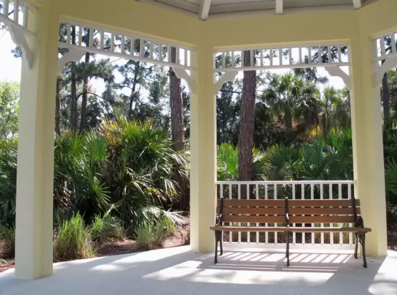 Master-planned community with lovely shady walking paths alongside sunlit forest areas with gopher tortoises.