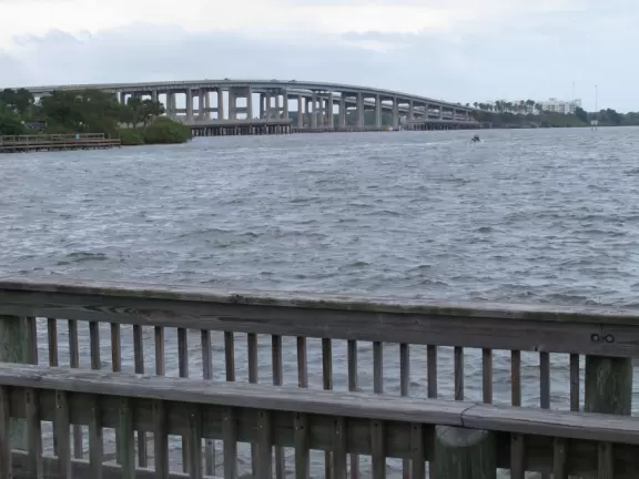 A cute historic area with sidewalk cafes and a waterfront park.