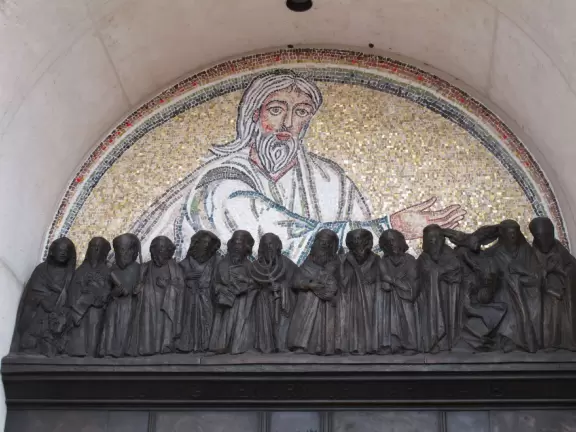 Beautiful modern basilica with gift shop, water lilies, stained glass, rose window, organ and exceptional choir.