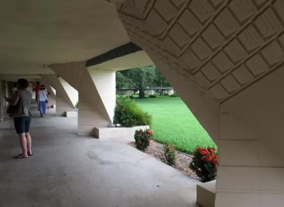 Private university with raised views over a lake, and Frank Lloyd Wright architecture.