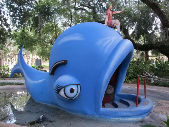 Whimsical sculptures of fairy tale scenes in the middle of a giant oak forest with Spanish moss and vines. Magic!