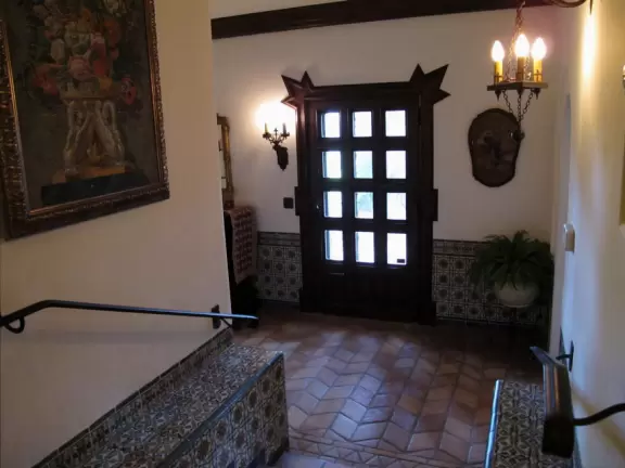 World-class garden with pink marble tower on a pond, giant lily pads, views from up high, and a magical wooded children's area.